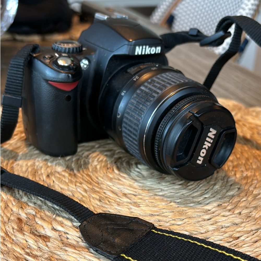 Nikon D40 camera, used and does not turn on (likely needs a new battery)